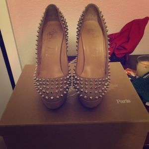 Bianca Spikes Christian Louboutins.